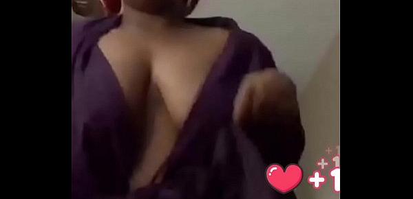  Beautiful black girl showing her big breast and shaved pussy before getting banned on Bigo